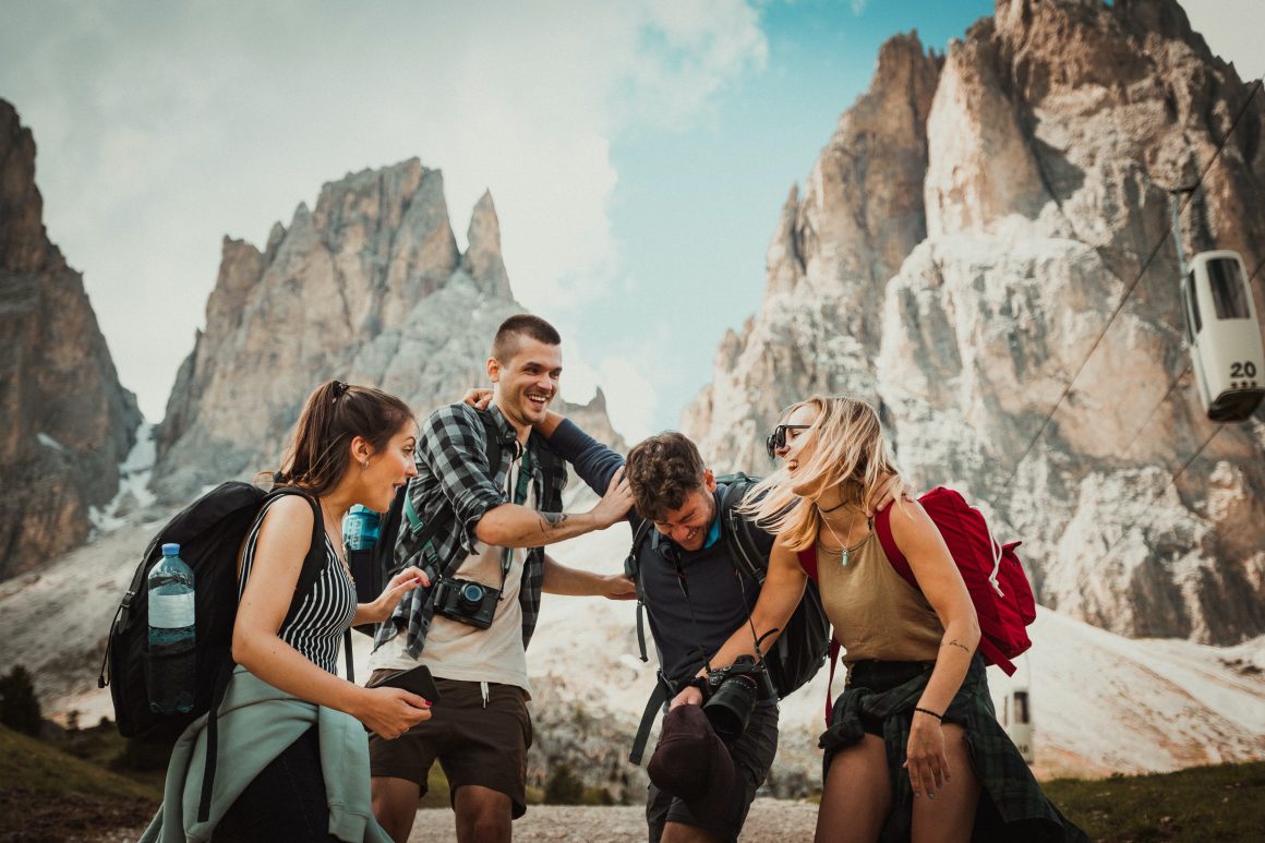 Group of travelers laughing together