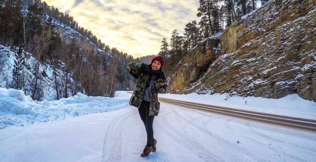 Christina posing in Spearfish Canyon snow